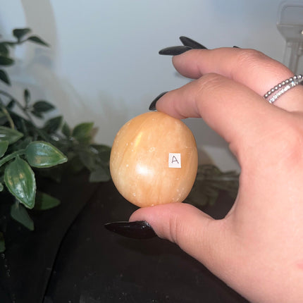 Orange Calcite Palm Stones